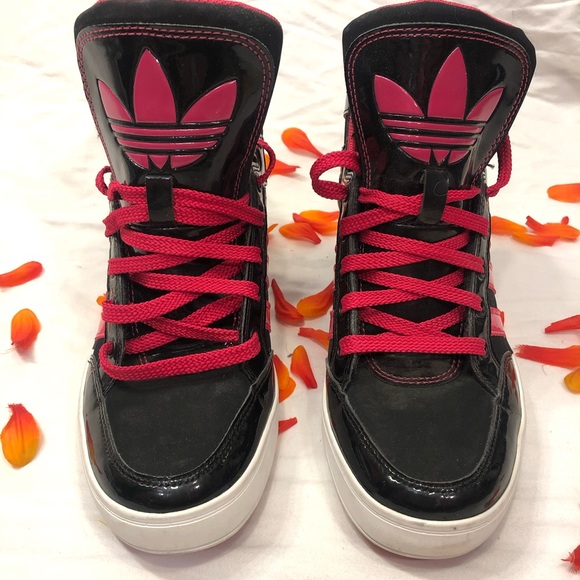 pink and black adidas sneakers